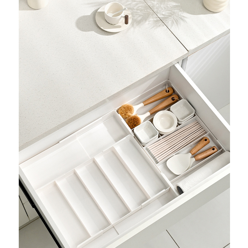Empty adjustable drawer divider, customizable compartments for kitchen utensils