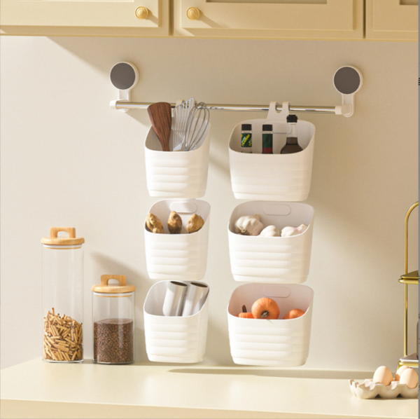 White PP plastic wall hanging baskets used for kitchen spice and utensil organization