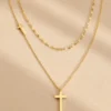 Gold layered cross pendant necklace with adjustable chain