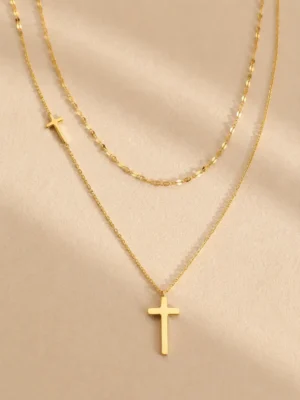 Gold layered cross pendant necklace with adjustable chain