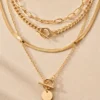 Gold layered toggle necklace with round coin pendant