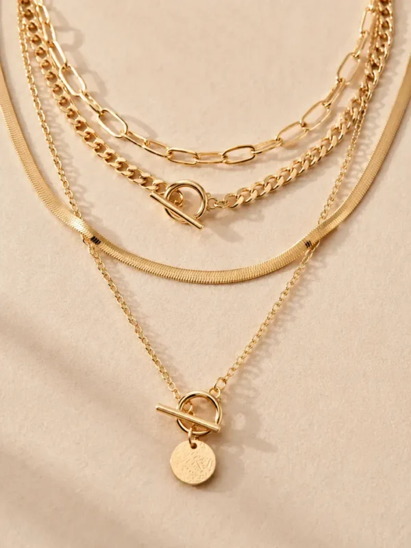 Gold layered toggle necklace with round coin pendant