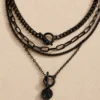 Black layered toggle necklace with round coin pendant