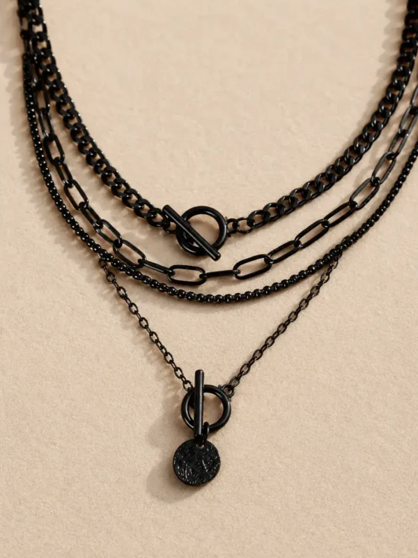 Black layered toggle necklace with round coin pendant