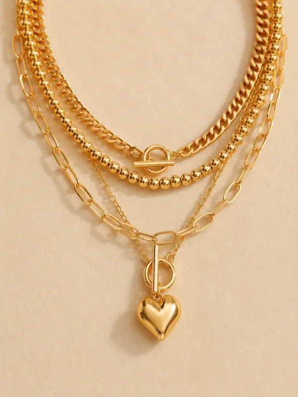 Gold layered toggle necklace with heart pendant