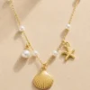 Gold irregular pearl pendant necklace with paperclip chain