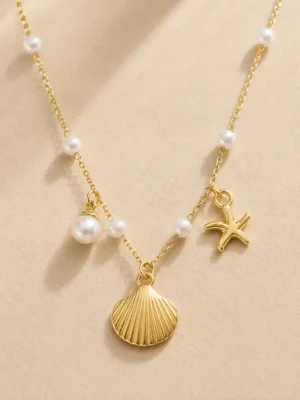 Gold irregular pearl pendant necklace with paperclip chain