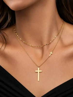 Gold layered cross pendant necklace with adjustable chain