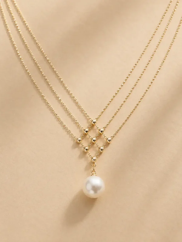Gold geometric pearl pendant necklace product image