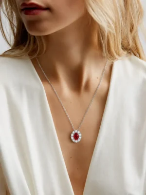 Model wearing 925 sterling silver ruby red gemstone halo necklace