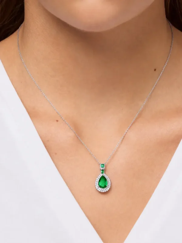 Model wearing 925 sterling silver emerald green gemstone pendant necklace