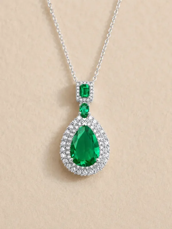 925 sterling silver emerald green gemstone halo pendant necklace close up