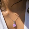 Model wearing 925 sterling silver purple crystal pendant necklace
