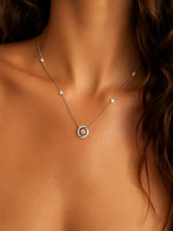Model wearing S999 silver floating crystal pendant necklace