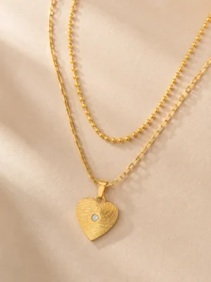 18K gold-plated textured heart layered necklace close up