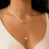 Model wearing freshwater pearl Y drop necklace