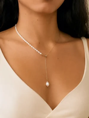 Model wearing freshwater pearl Y drop necklace