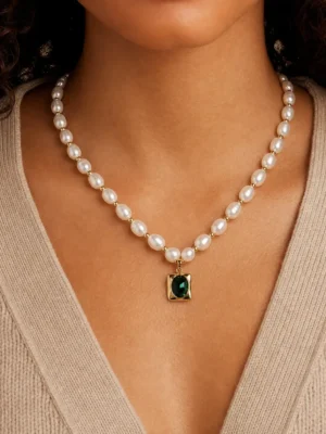 Model wearing freshwater pearl green stone necklace