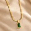 Gold PVD green stone pendant necklace close up