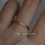 Thin Gold Stacking Ring with 3 CZ Stones Dainty Titanium Steel Minimalist Ring - view 2